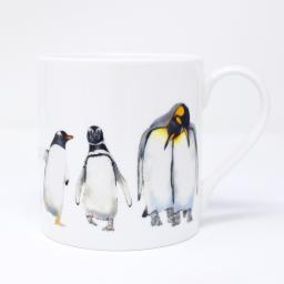 A quite big mug with a penguin design - handle facing right