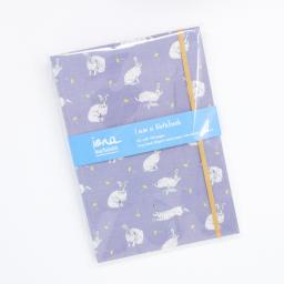 A notebook with elasticated enclosure with a hare and dandelion design