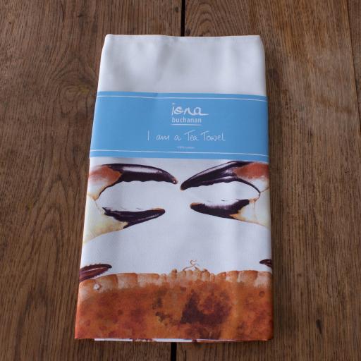 tea towel with crab design in packaging