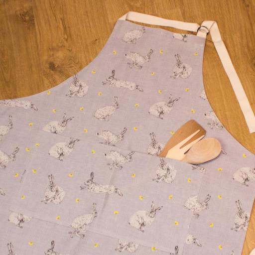 An apron with a Hare & Dandelion design