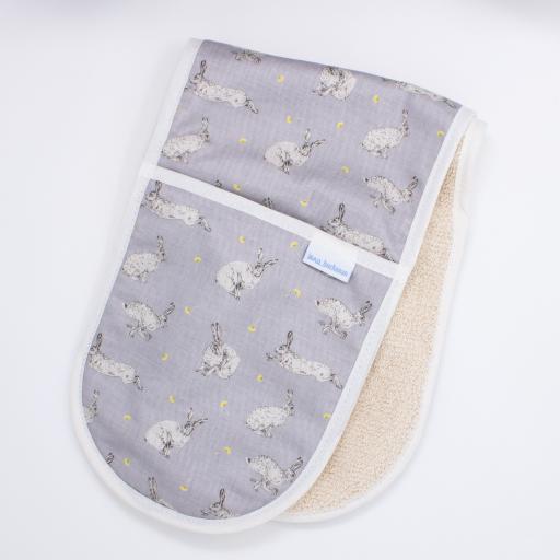 Oven gloves in a hare and dandelion flower design